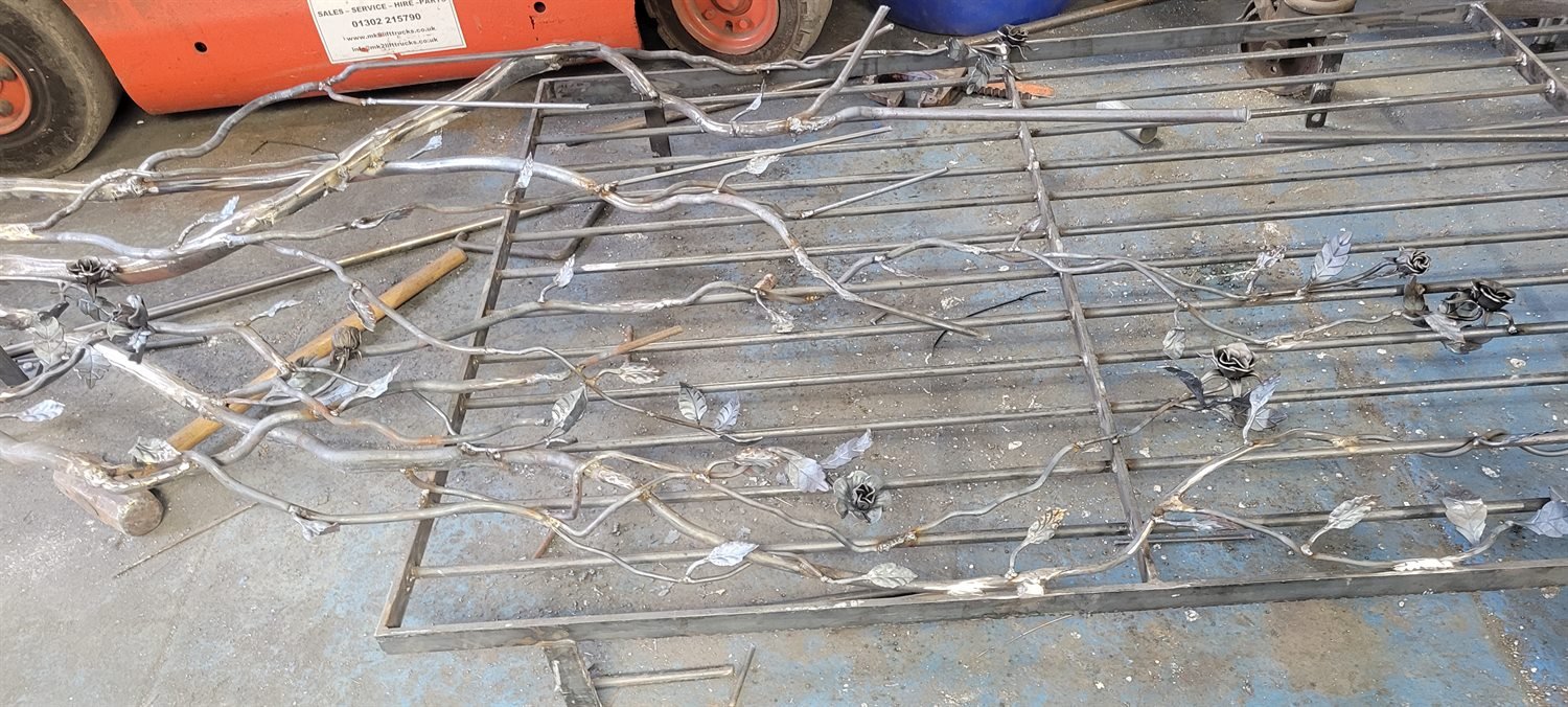Bespoke steel art laid out during fabrication