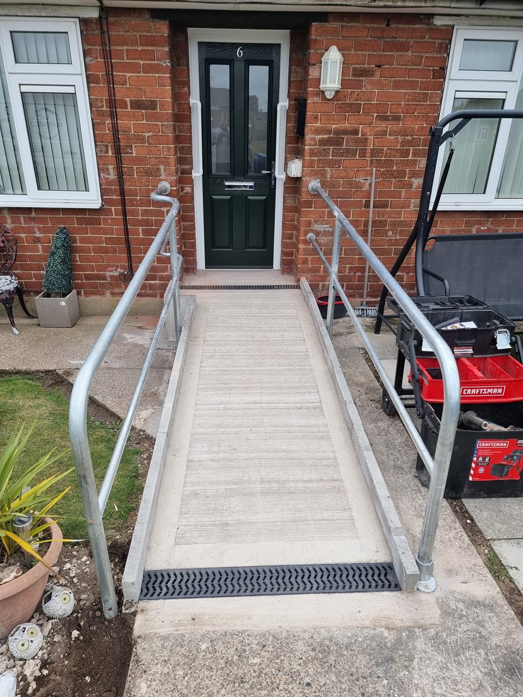 Steel ramp handrail fitted outside a home